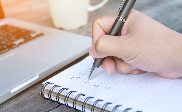 hand write to do list on notebook